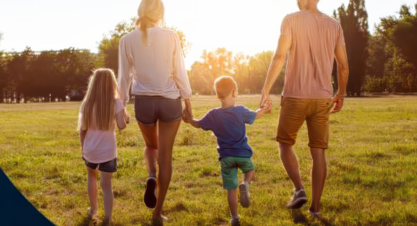 2023 Health & Wellness Survey background photo (family walking into sunset)